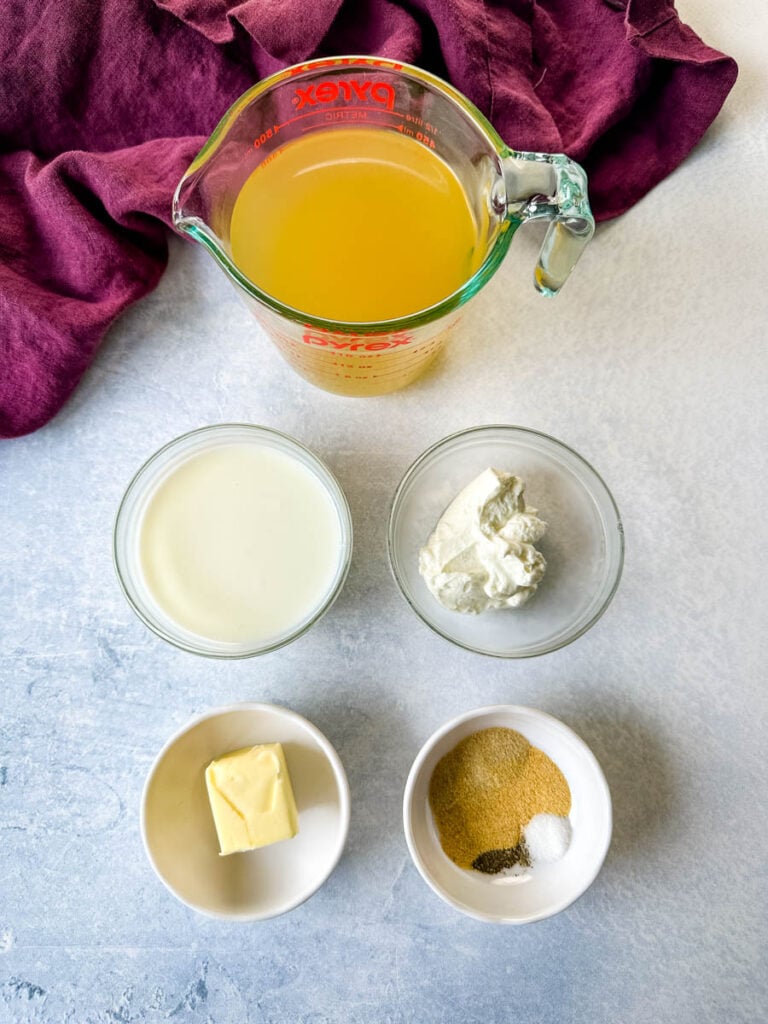 broth, buttermilk, sour cream, butter, and spices in glass bowls