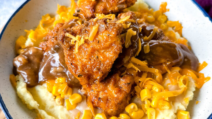 KFC famous mashed potatoes bowl with chicken, gravy, and cheese