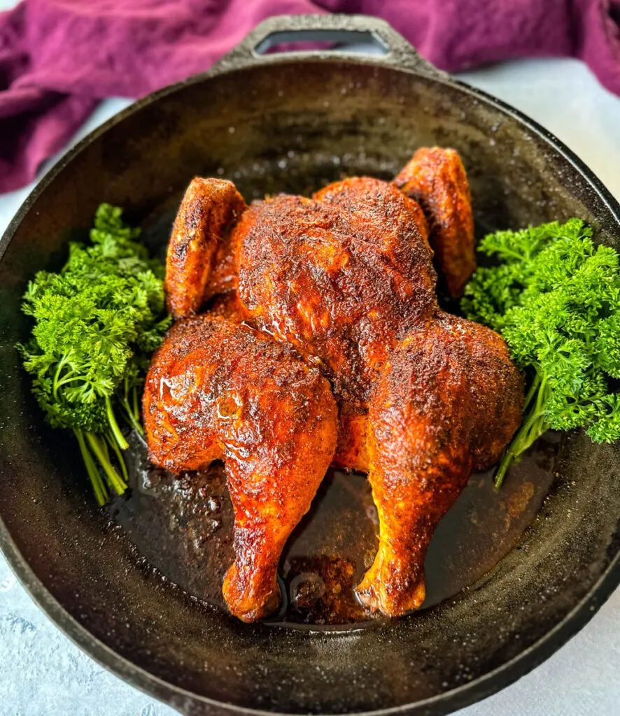 baked and roasted Thanksgiving chicken in a cast iron skillet