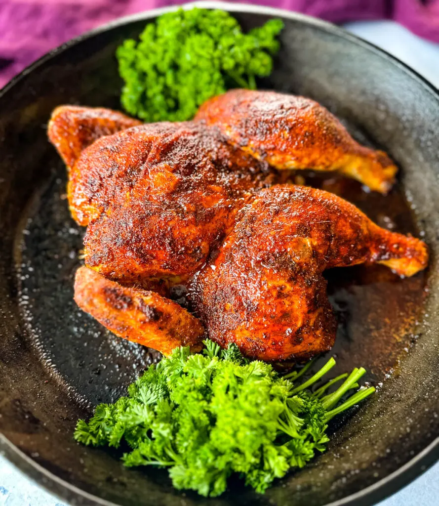 baked and roasted Thanksgiving chicken in a cast iron skillet