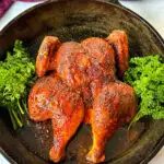 baked and roasted Thanksgiving chicken in a cast iron skillet