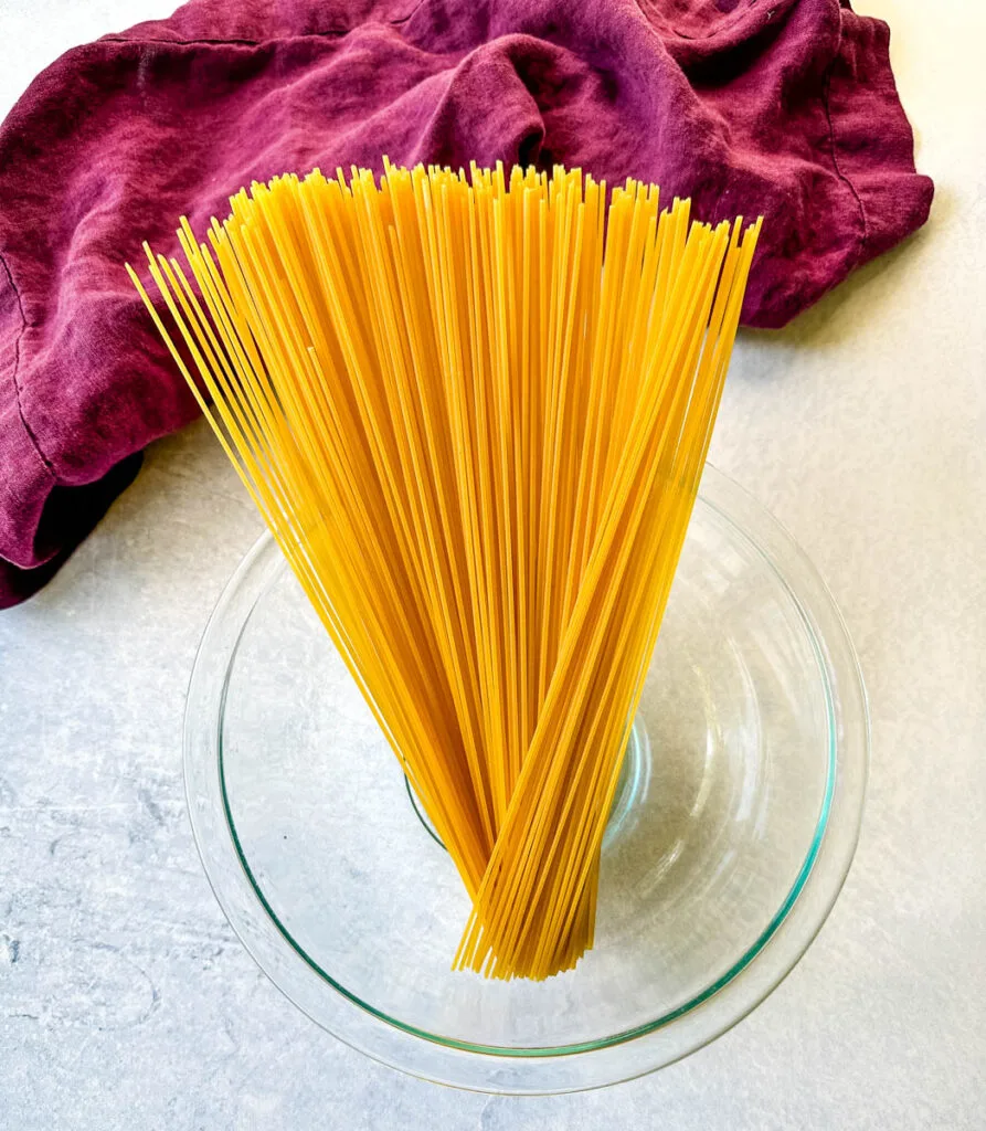 spaghetti pasta noodles in a glass bowl