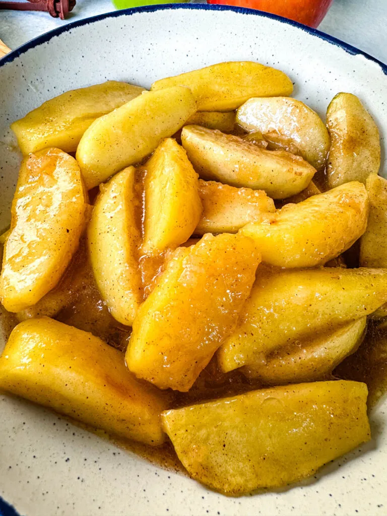 slow cooker Crockpot baked apples in a white bowl