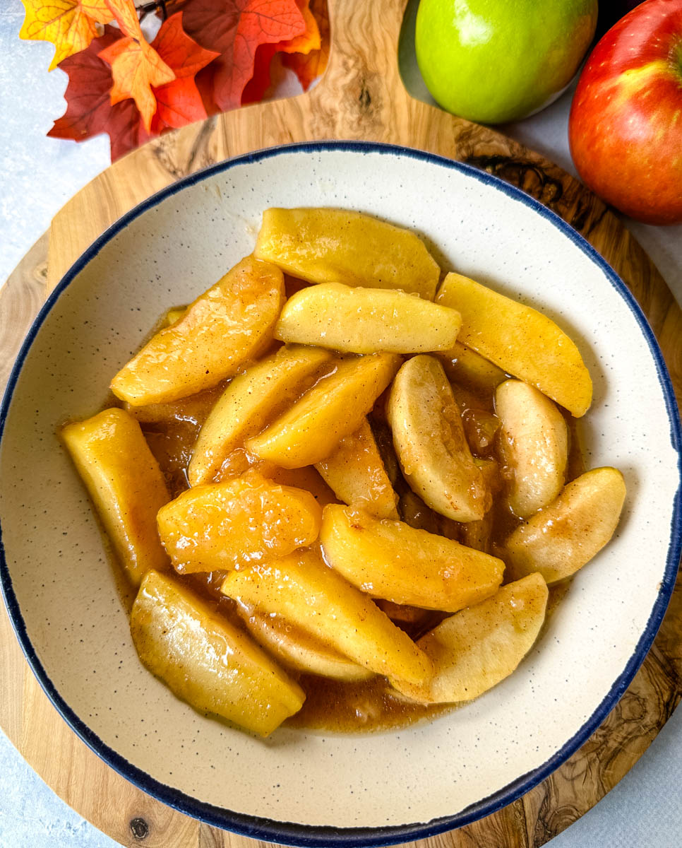 slow cooker Crockpot baked apples in a white bowl