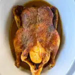 cooked whole duck in a Crockpot slow cooker