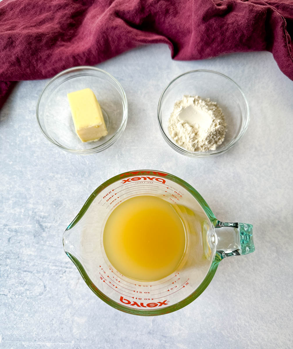 butter, flour, and broth in separate glass bowls