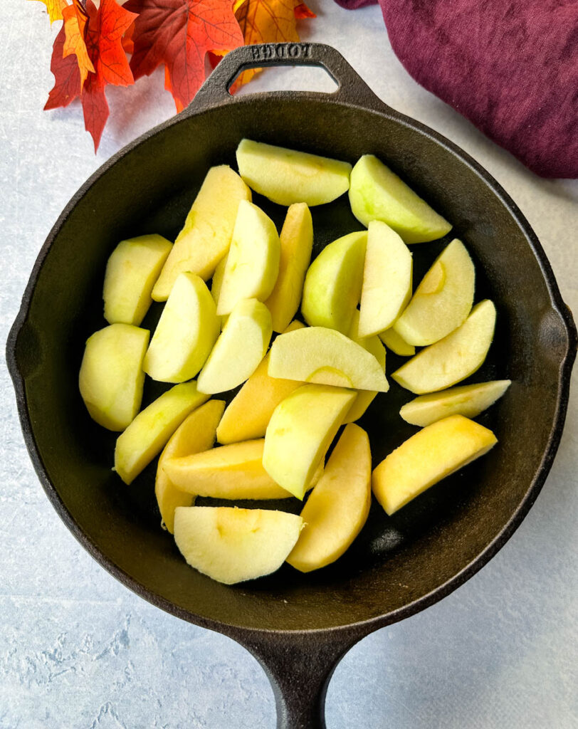 granny smith apples in a cast iron skillet