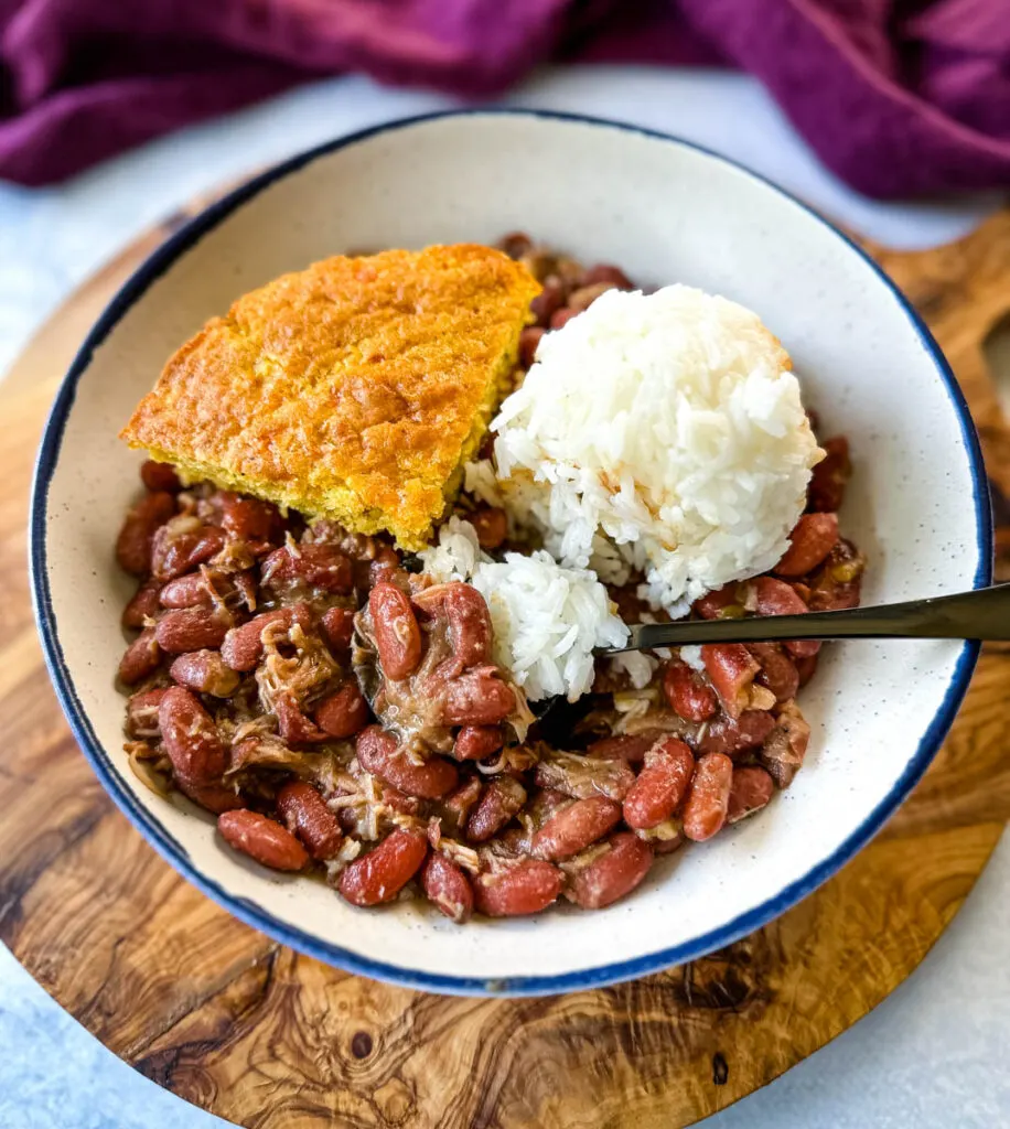Southern Cajun red beans and rice with smoked turkey in a bowl with cornbread
