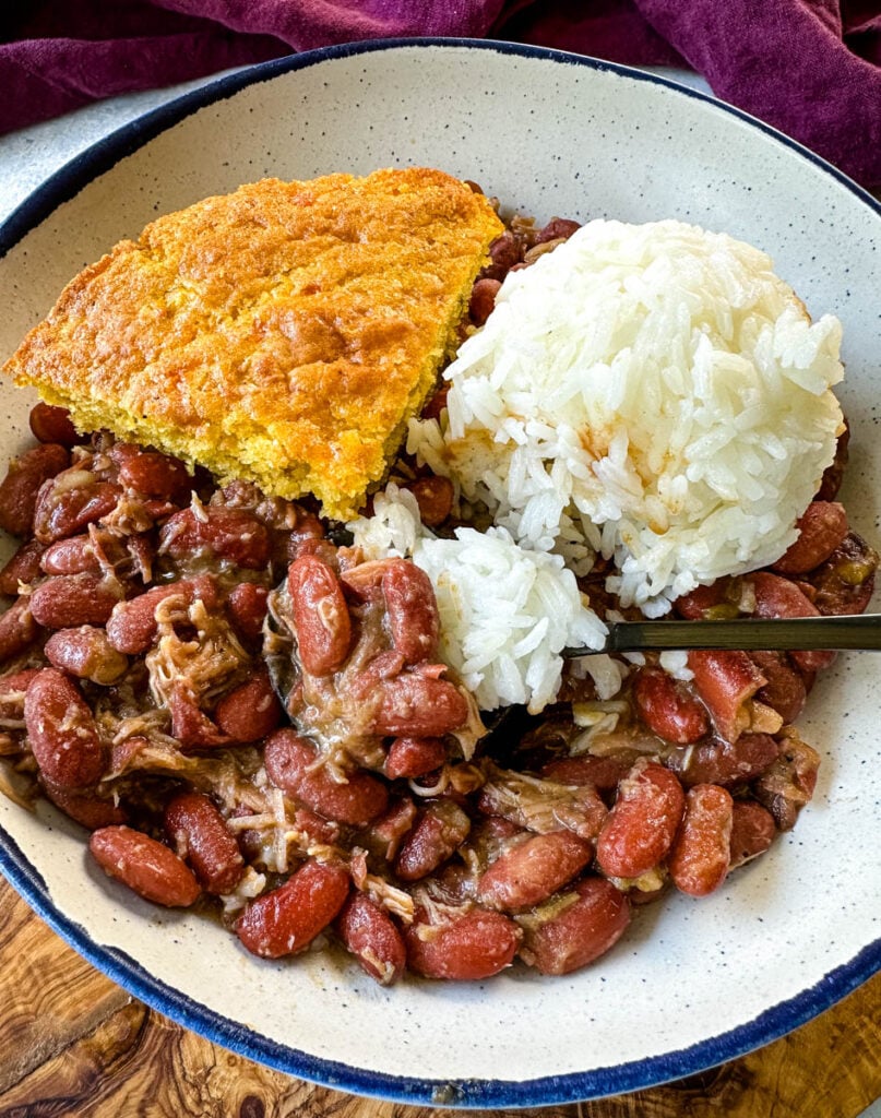 Southern Cajun red beans and rice with smoked turkey in a bowl with cornbread