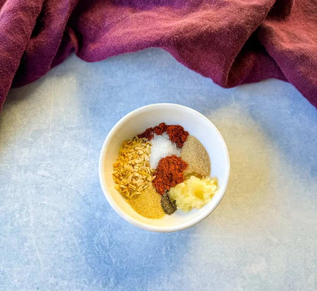 homemade burger rub seasoning spices in a white bowl