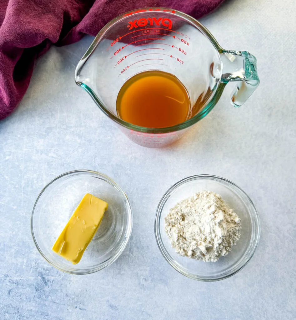 beef broth, butter, and all purpose in separate glass bowls