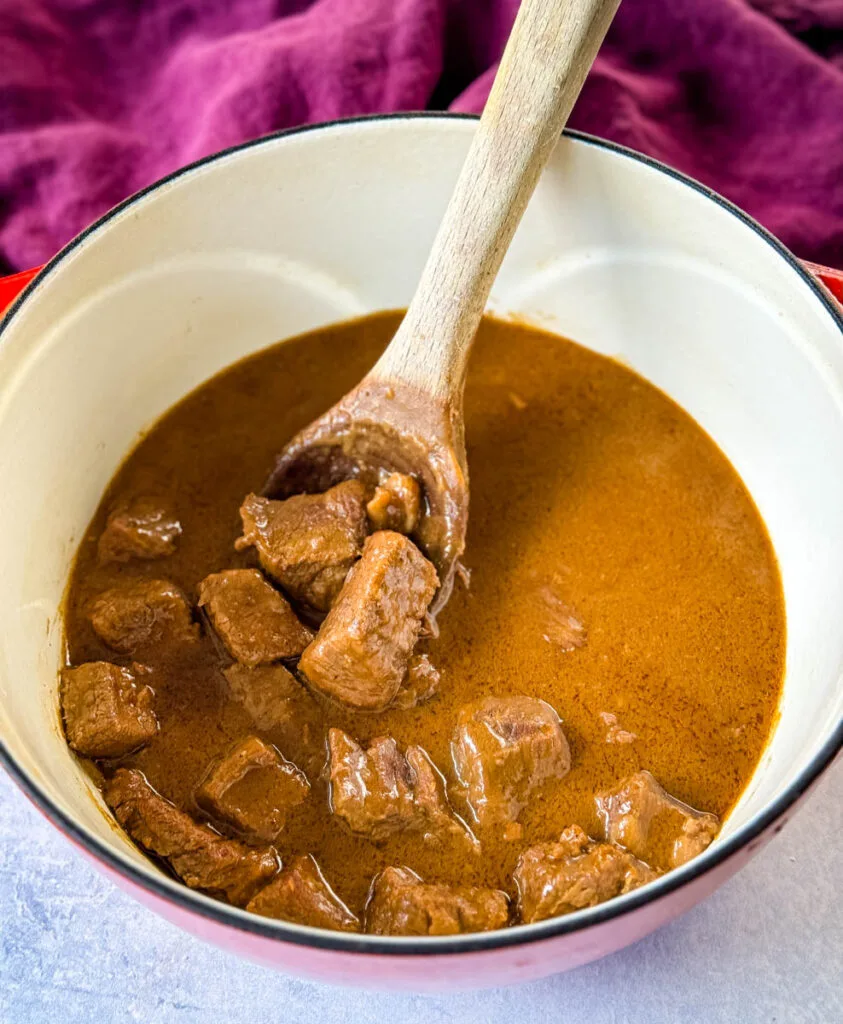 beef tips and gravy in a Dutch oven pot