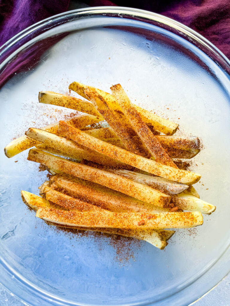 sliced potatoes with Cajun seasoning