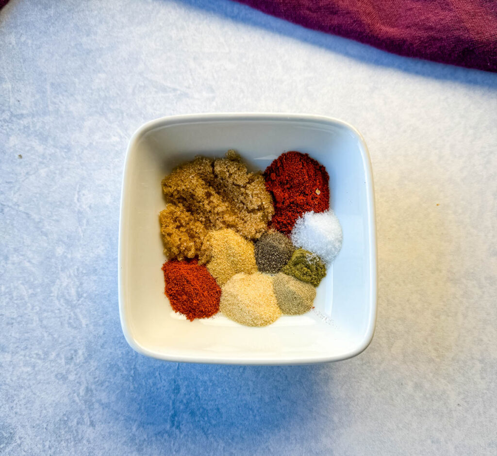 homemade Cajun rub seasonings in a white bowl