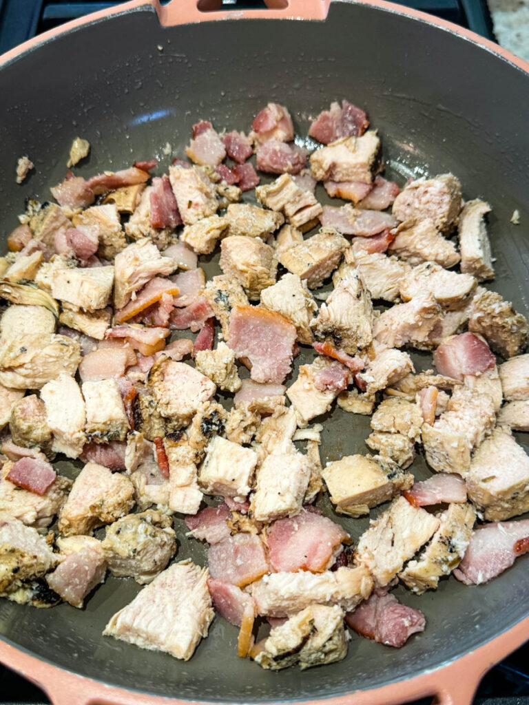 cooked chicken and bacon in a skillet