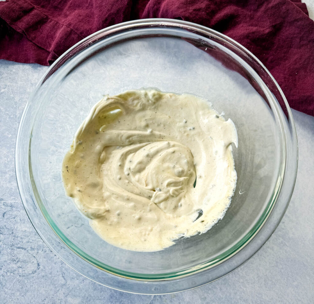 mayo, garlic powder, onion powder, and chives in a glass bowl