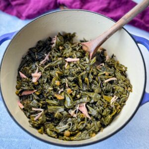 mixed greens with smoked turkey in a Dutch oven