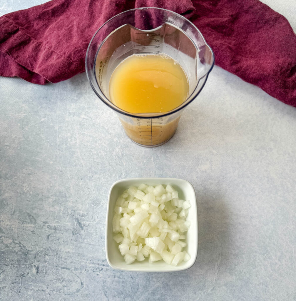 chopped onions and broth in separate bowls