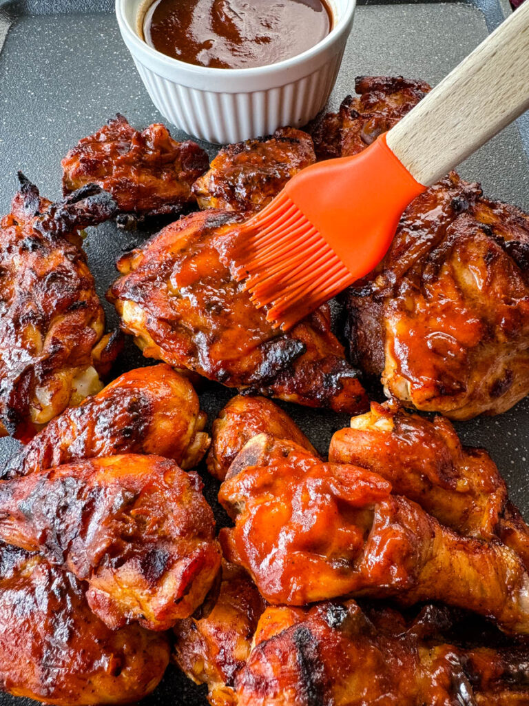 grilled bbq chicken brushed with BBQ sauce