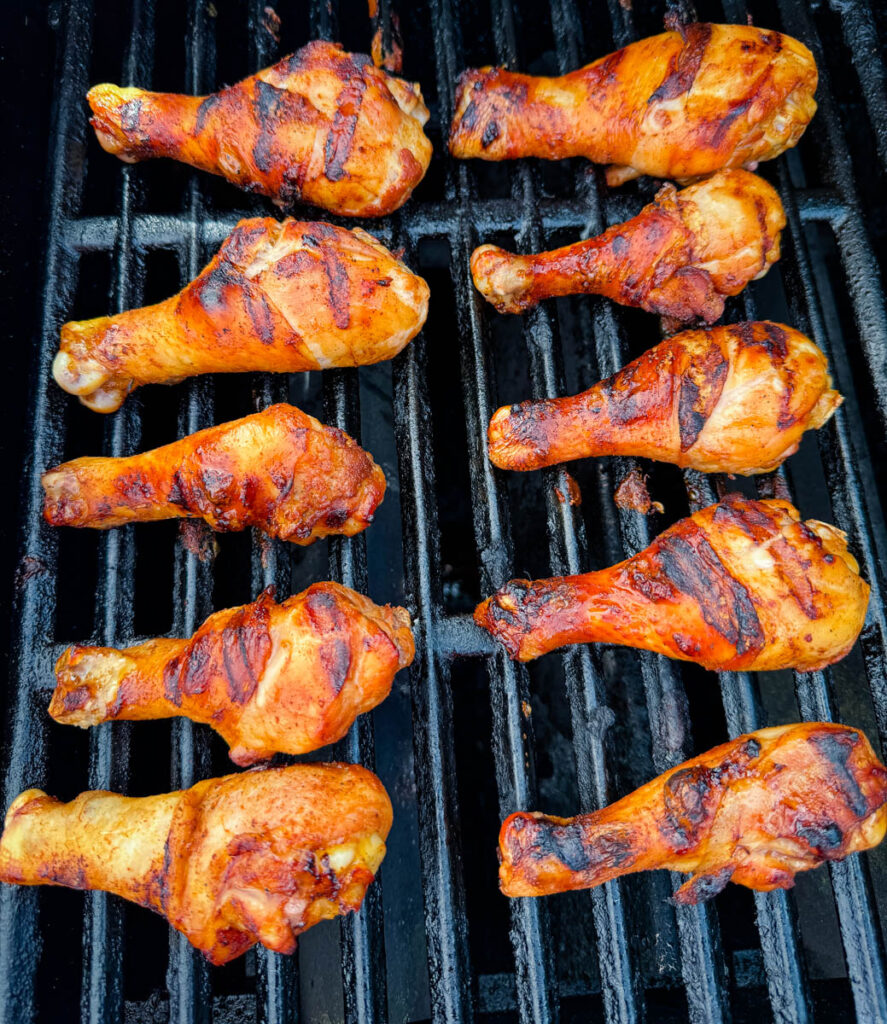 chicken drumsticks on a grill
