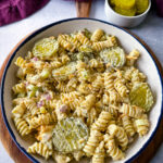 dill pickle pasta salad in a white bowl