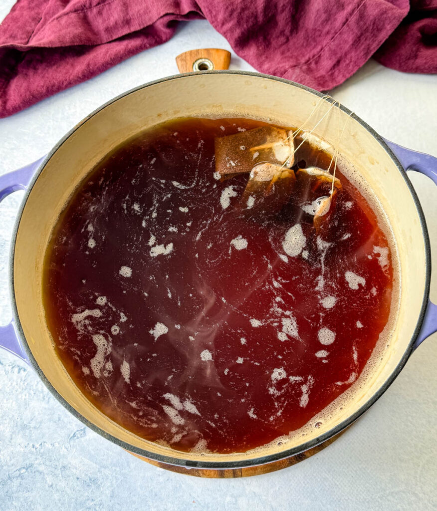 hot tea and teabags in a Dutch oven