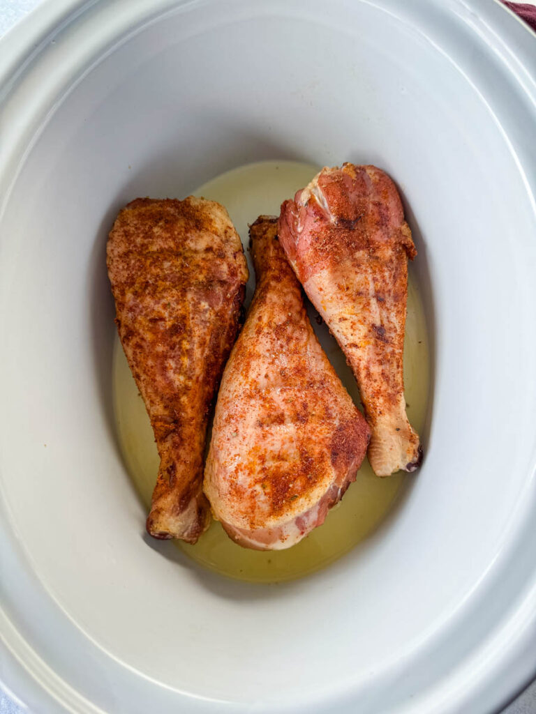 smoked turkey legs in a slow cooker