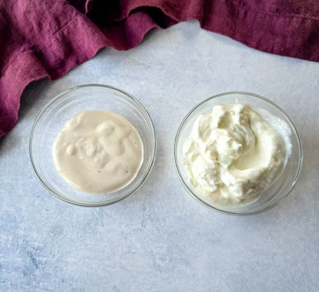 ranch dressing and plain Greek yogurt in separate glass bowls