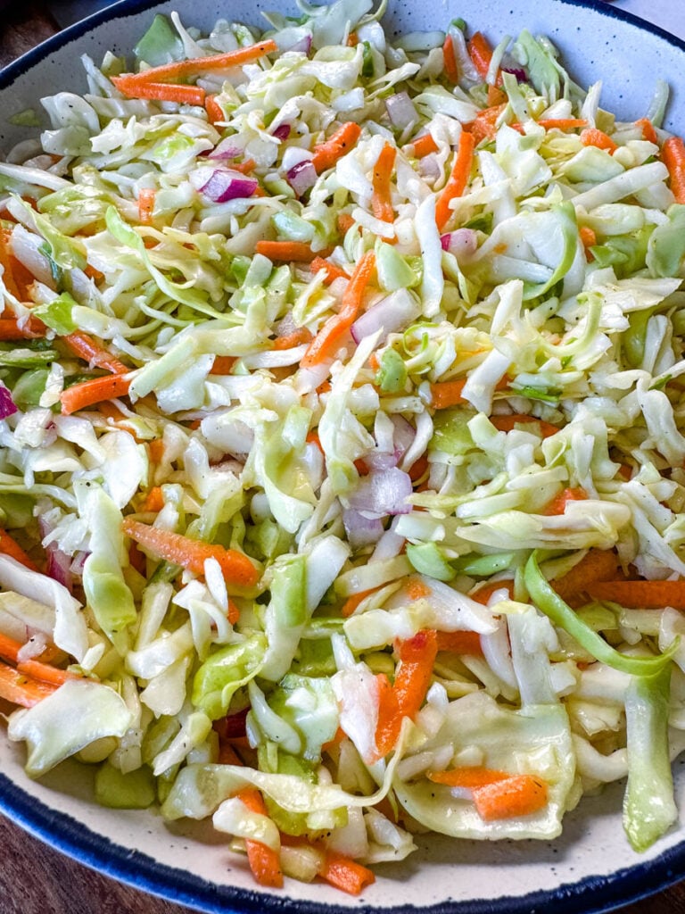 vinegar coleslaw made without mayo in a white bowl