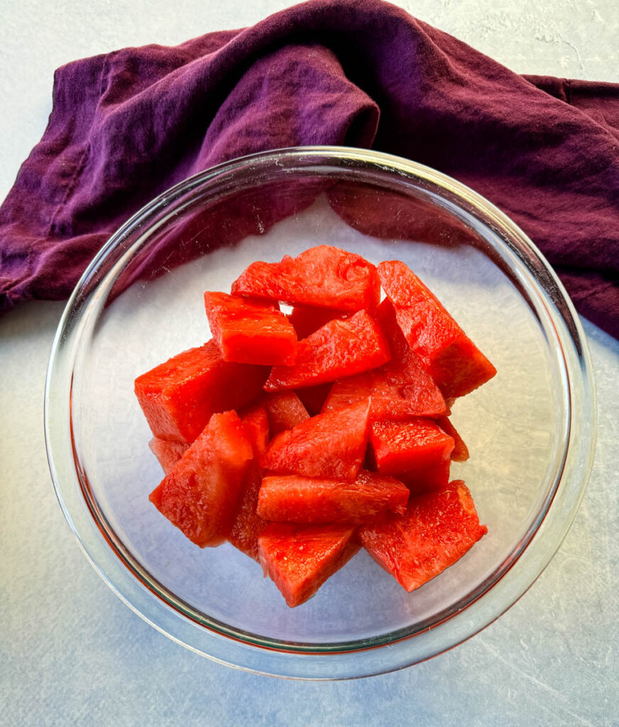cubed watermelon in a glass bowl