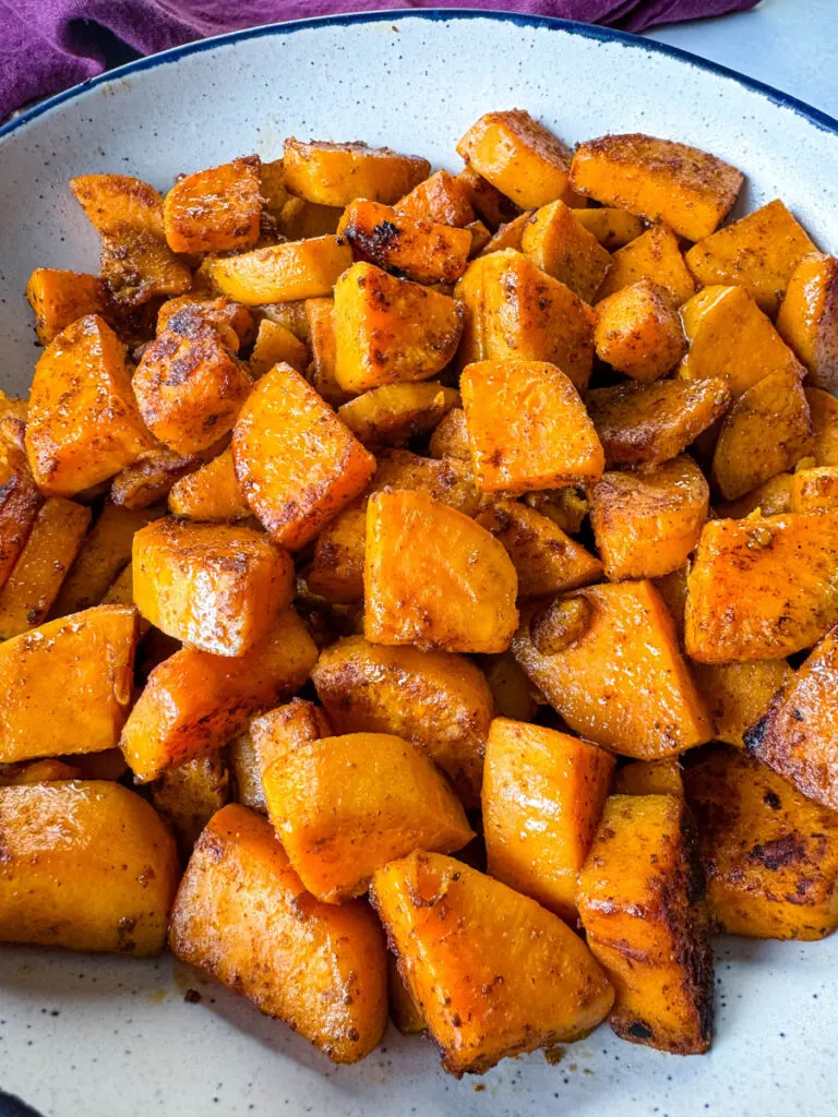 fried sweet potatoes in a white bowl