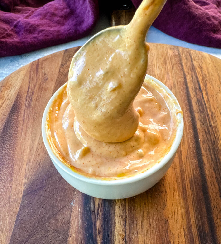 homemade burger sauce in a white bowl with a spoon