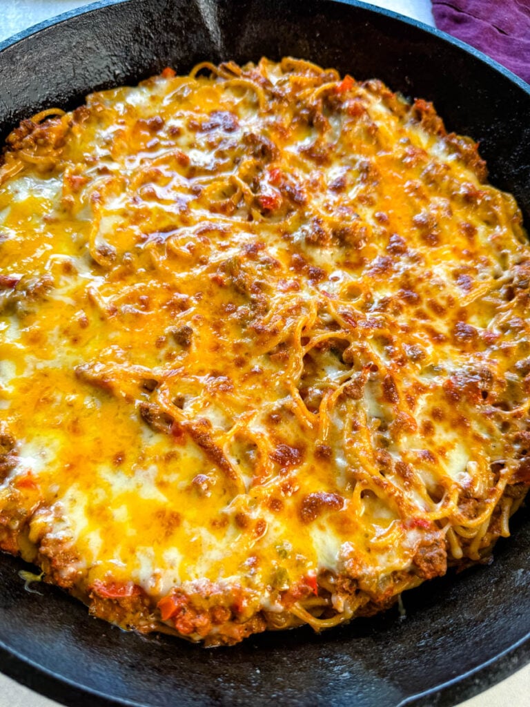 million dollar spaghetti in a cast iron skillet