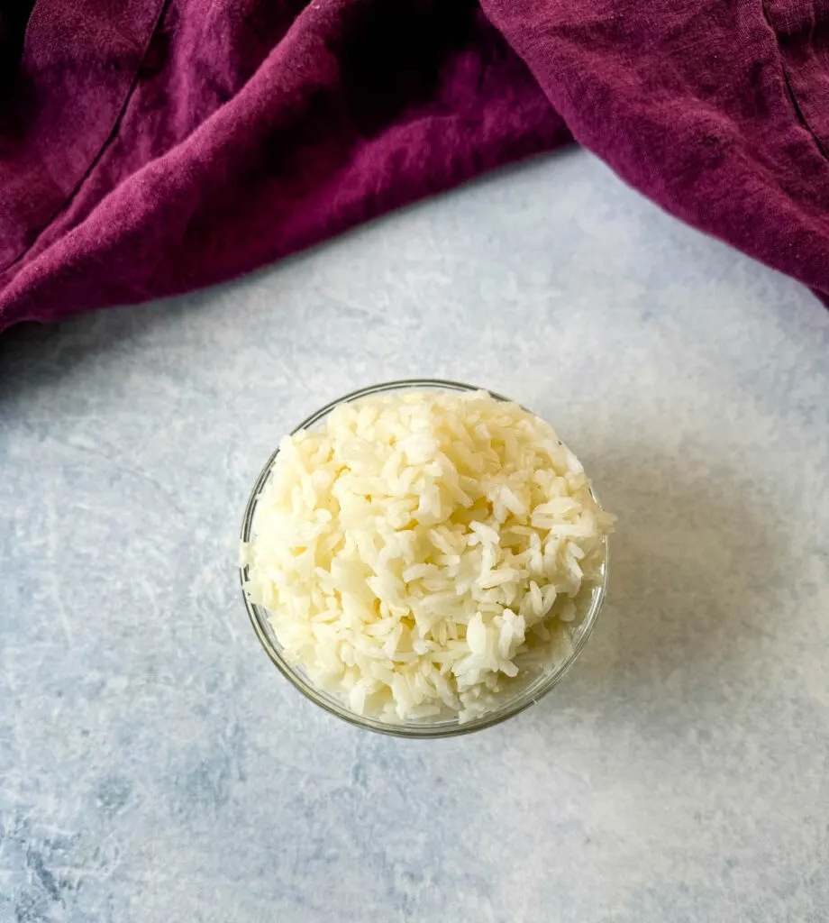 cooked cold rice in a glass bowl