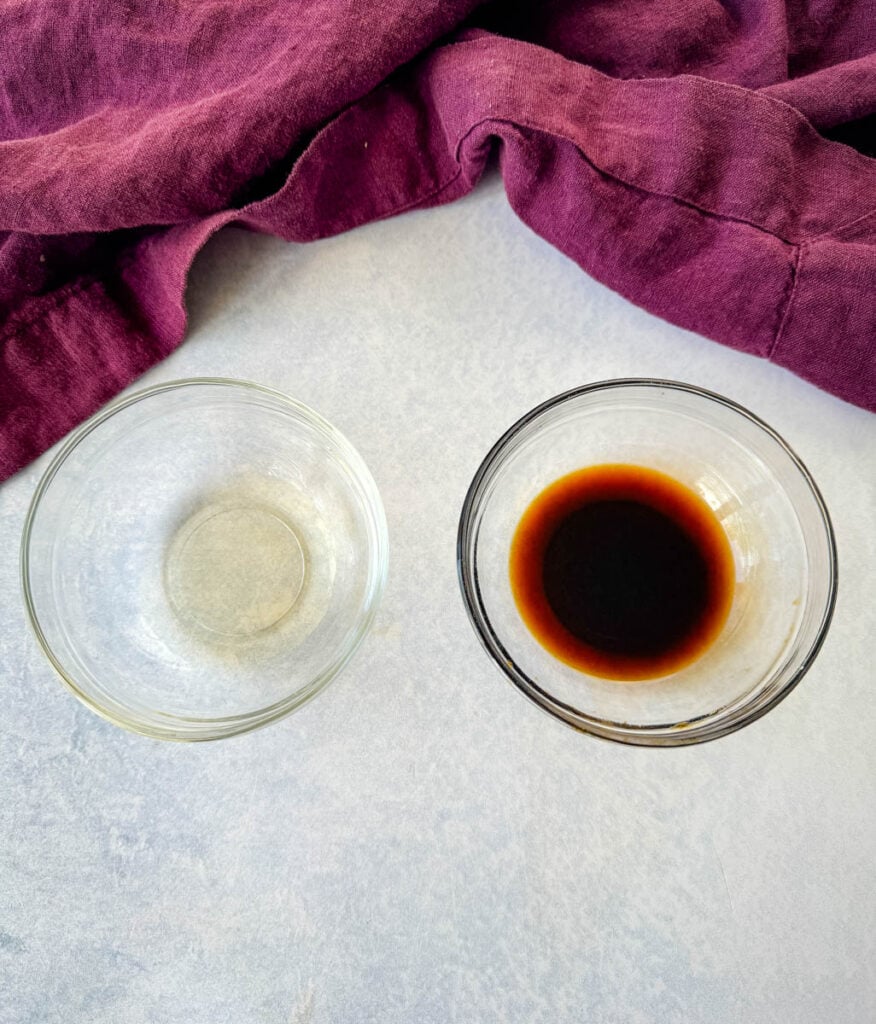soy sauce and rice wine vinegar in separate glass bowls