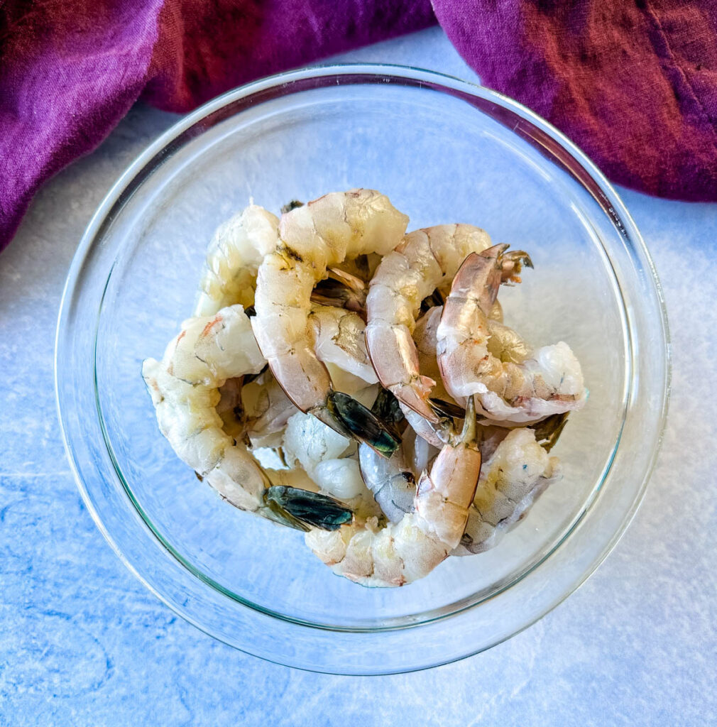 raw shrimp in a glass bowl