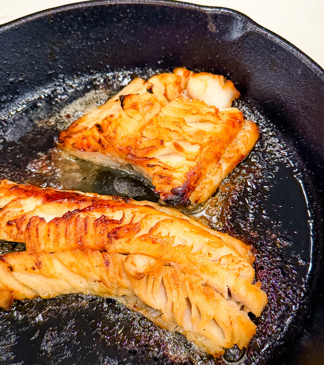 nobu miso black cod in a cast iron skillet
