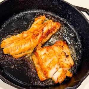 nobu miso black cod in a cast iron skillet