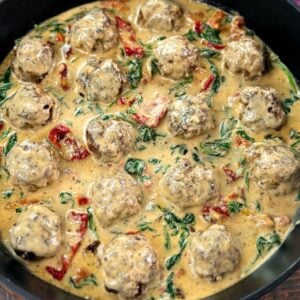 marry me meatballs in Tuscan cream sauce in a cast iron skillet