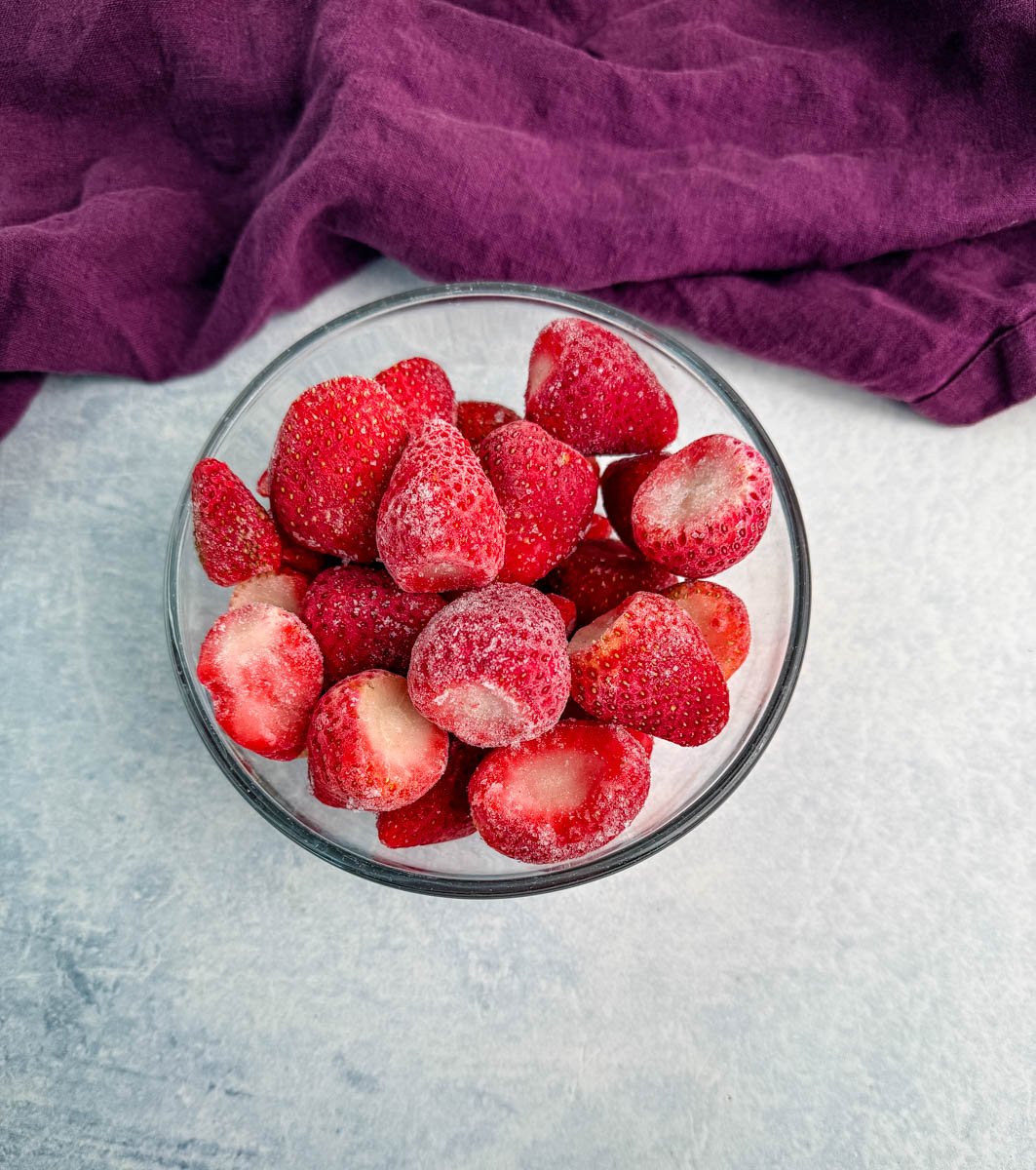 frozen strawberries in a glass bowl