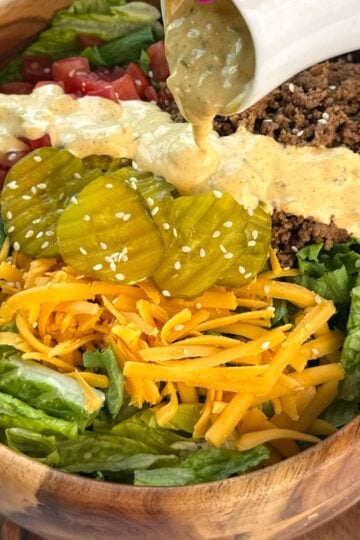 homemade big mac sauce drizzled over a burger salad bowl