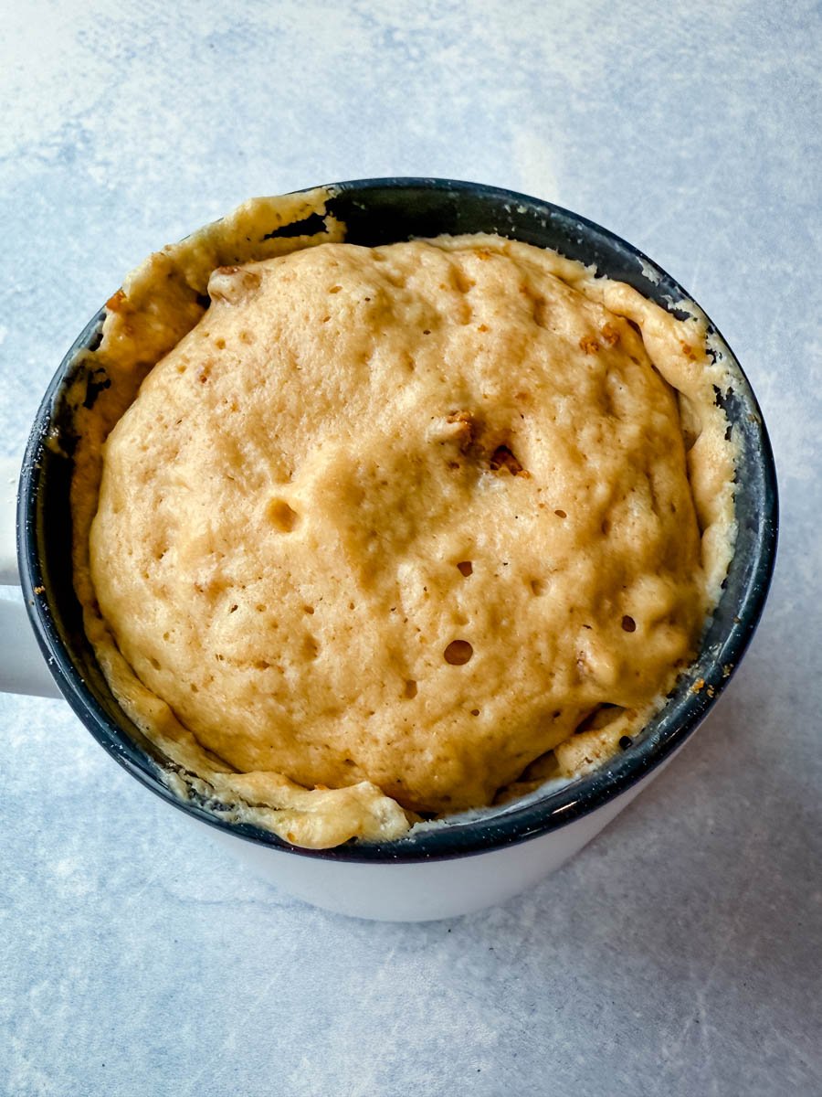 Biscoff mug cake inside of a mug