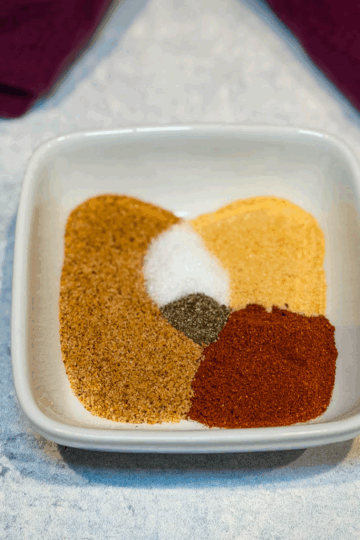 fried chicken seasoning in a white bowl