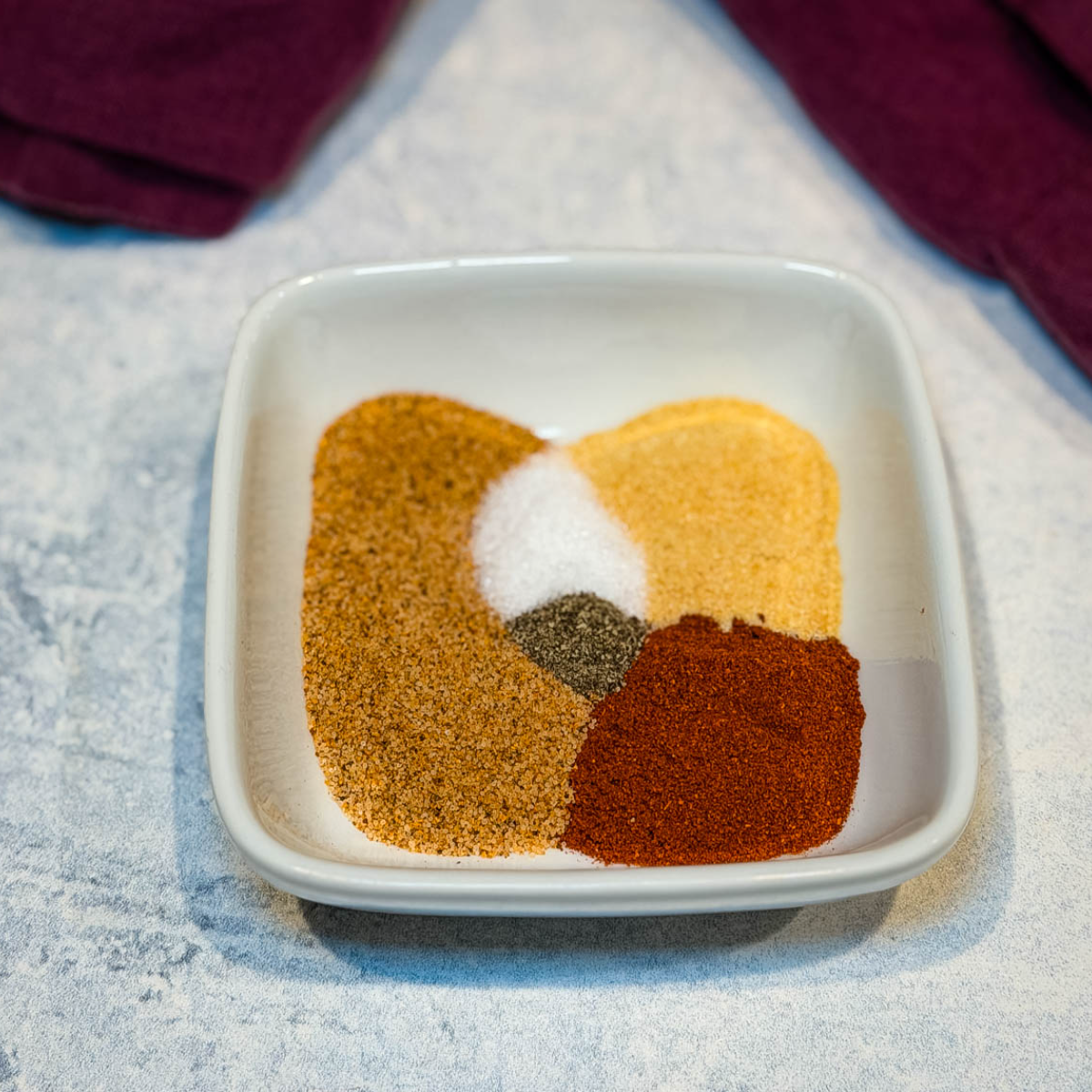 fried chicken seasoning in a white bowl