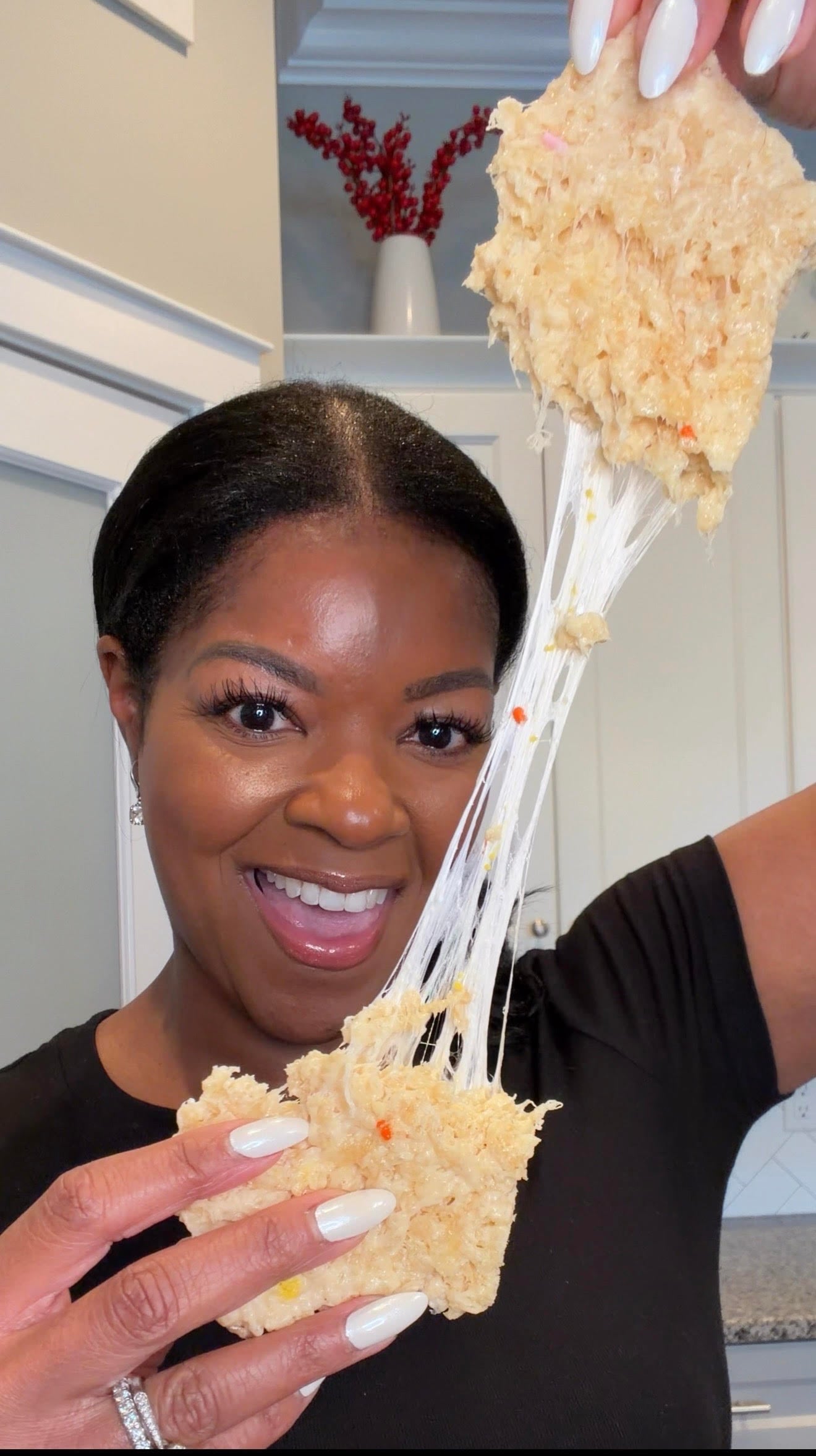 person holding gooey protein Rice Krispie treat