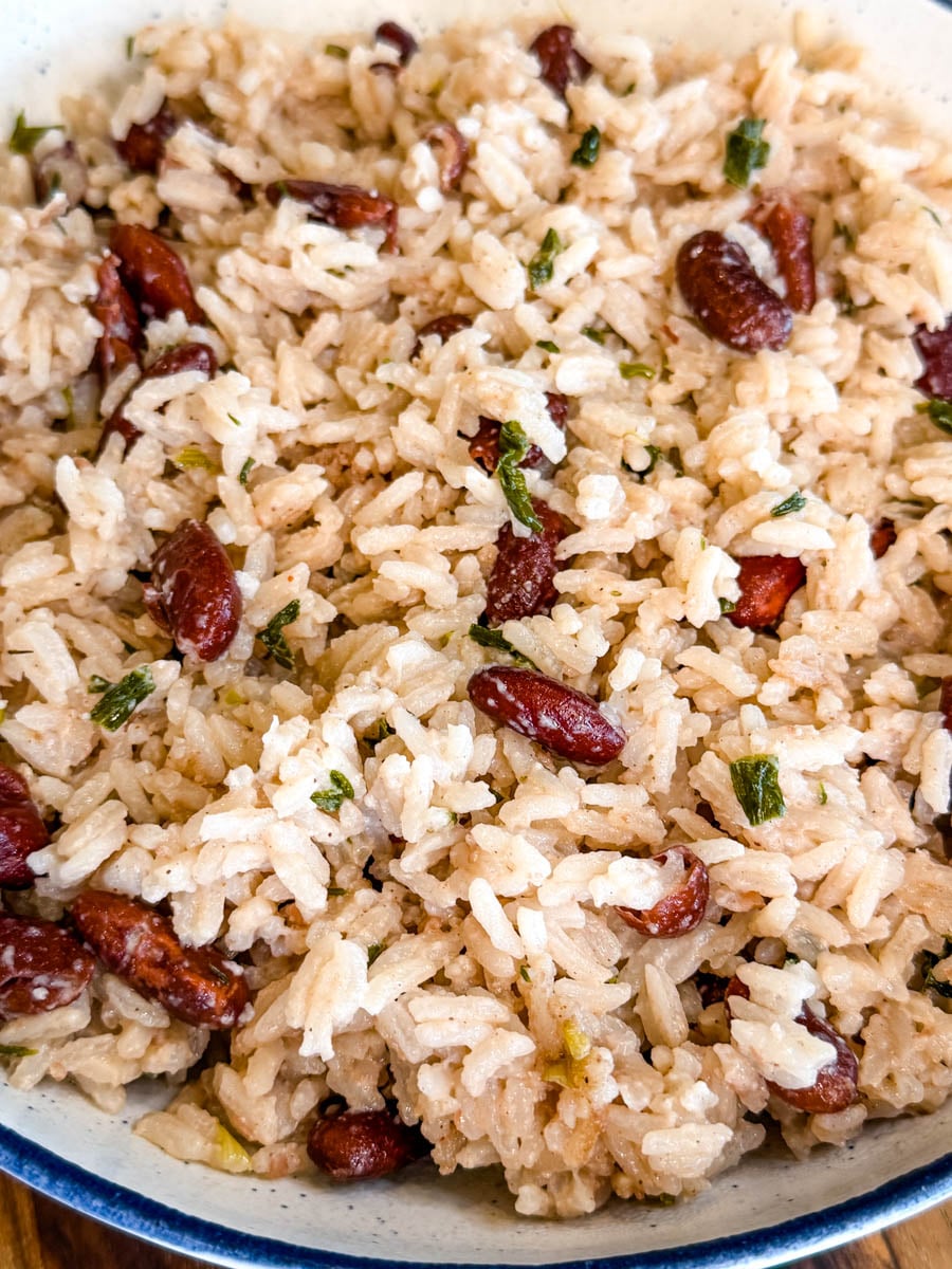 Detailed close-up of Jamaican rice and peas highlighting individual grains of coconut rice and kidney beans.