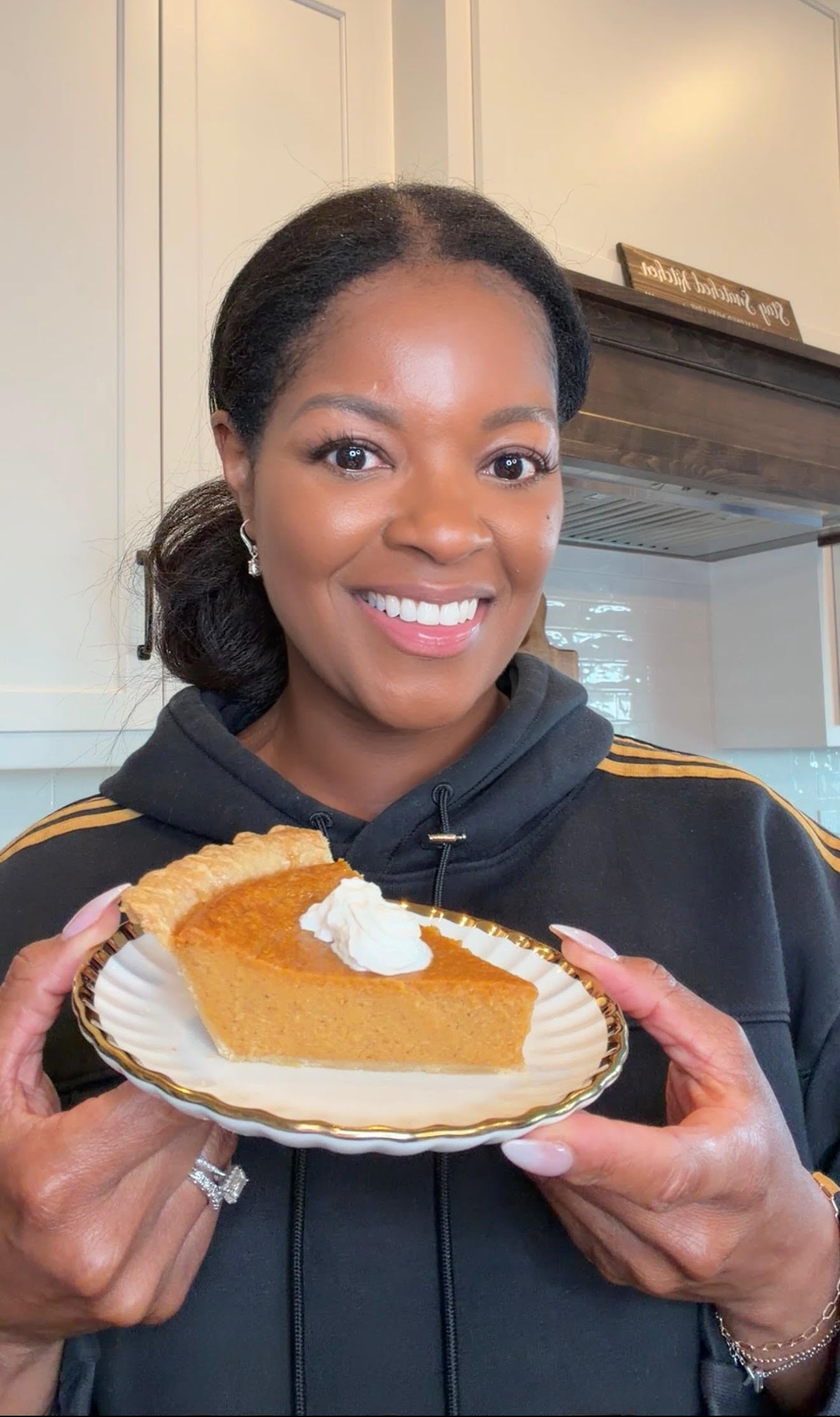 person holding a slice of Southern sweet potato pie