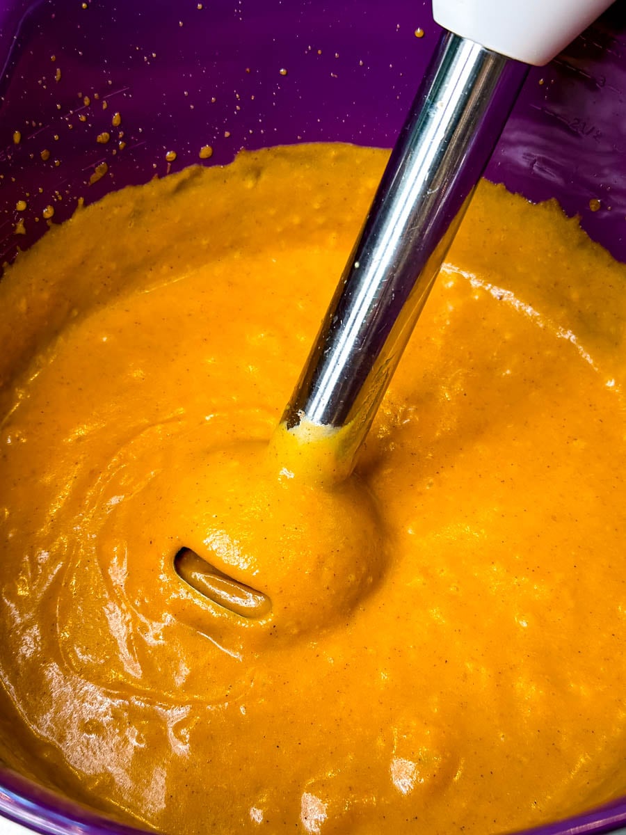 blended pumpkin pie filling in a mixing bowl